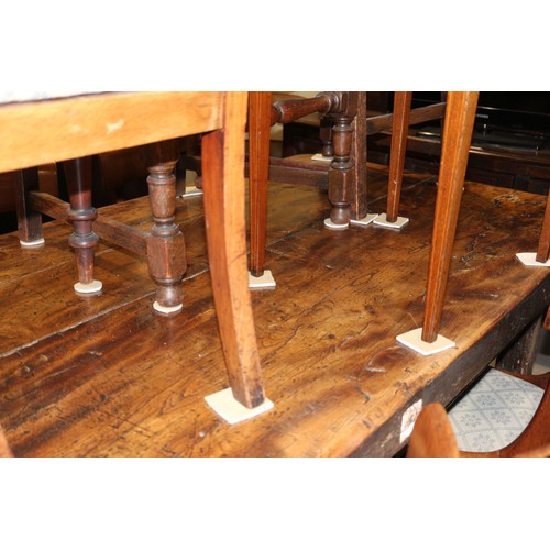 449 - An antique elm slab top refectory table, on chamfered and stretchered supports, top 84