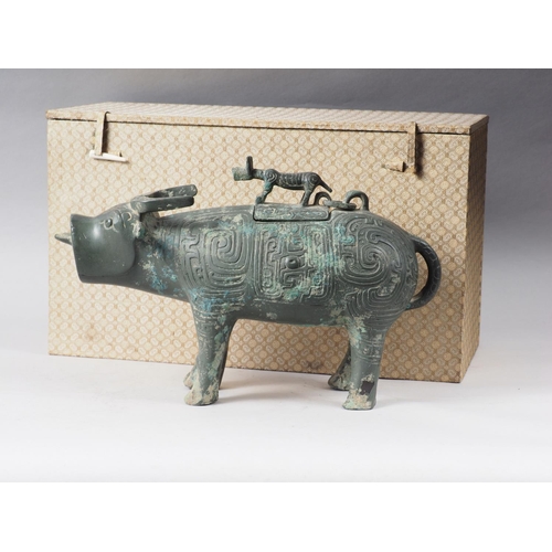 117 - A Chinese bronze limited edition ritual vessel, formed as a water buffalo with engraved archaic deco... 