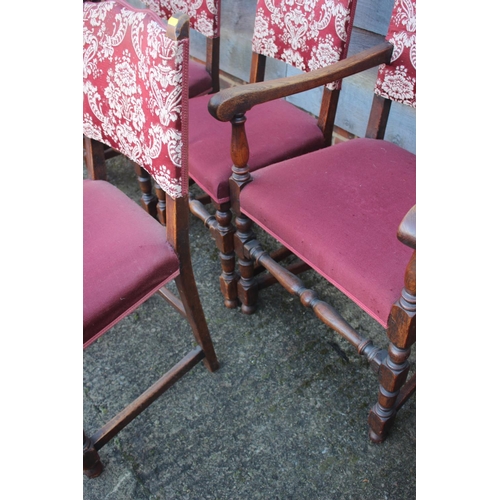 601 - A set of six Restoration design oak framed dining chairs with padded seats and backs (4+2)