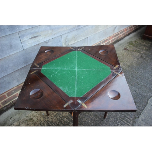 610 - A walnut and line inlaid envelope top card table, fitted one drawer, on square taper supports, 19