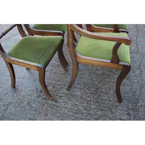 611 - A set of ten  mahogany rope twist bar back dining chairs with drop-in seats, on sabre supports (8+2)