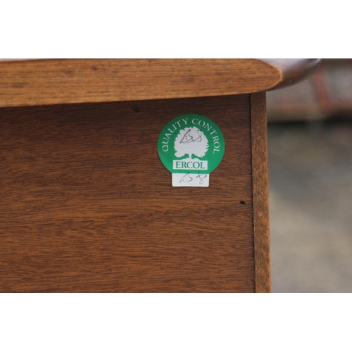 629 - An Ercol elm sideboard, fitted two drawers over two doors, on stile supports, 48