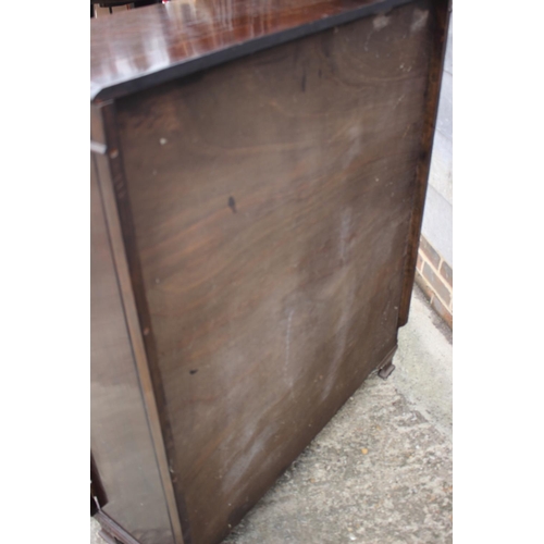 638 - A mahogany bookcase enclosed two astragal moulded glass panel doors, on ogee bracket feet, 37 wide x... 