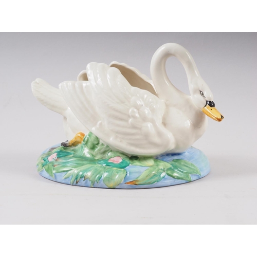 11 - A Clarice Cliff table centre, formed as a swan, 7