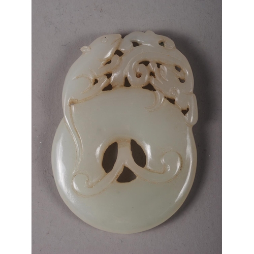 114 - A Chinese carved jade Pi disc with rat and dragon decoration, 2