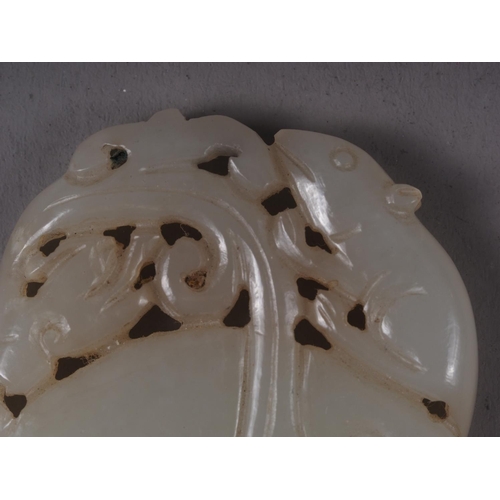 114 - A Chinese carved jade Pi disc with rat and dragon decoration, 2