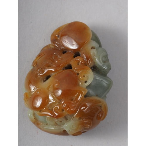 116 - A Chinese carved jade boulder with monkey and mythical beast, 4.6cm x 3.6cm approx