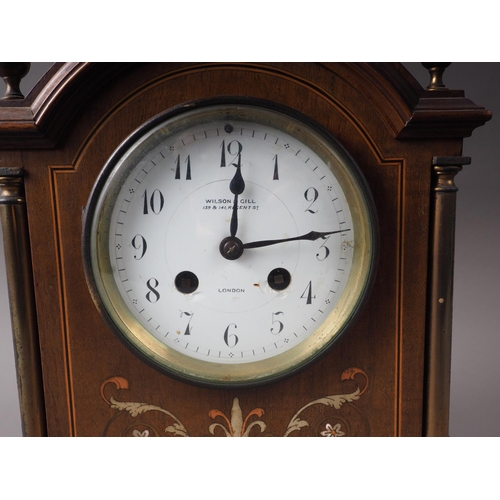 122 - An Edwardian walnut, brass and copper inlaid mantel clock, 10 1/2