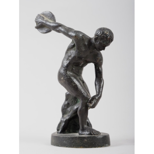 132 - A grand tour patinated bronze figure of the discus thrower after Myron, 5 1/4