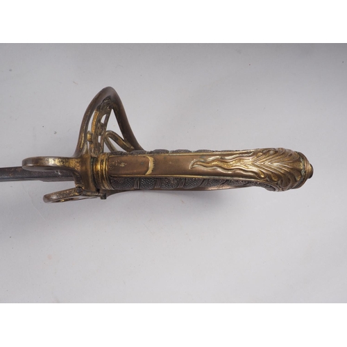 186 - A Victorian officer's dress sword with engraved blade, gilt hilt and guard, blade 32