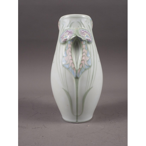 20 - A Limoges Art Nouveau style limited edition vase with relief handles, formed as flowers, 18/450, 18