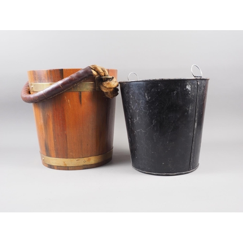 201 - A ship's wooden fire bucket with tin liner and leather-bound handle, decorated with coat of arms Ply... 