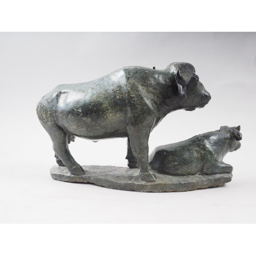 238 - Z F Runyanga: a carved greenstone model of a water buffalo and calf, 14