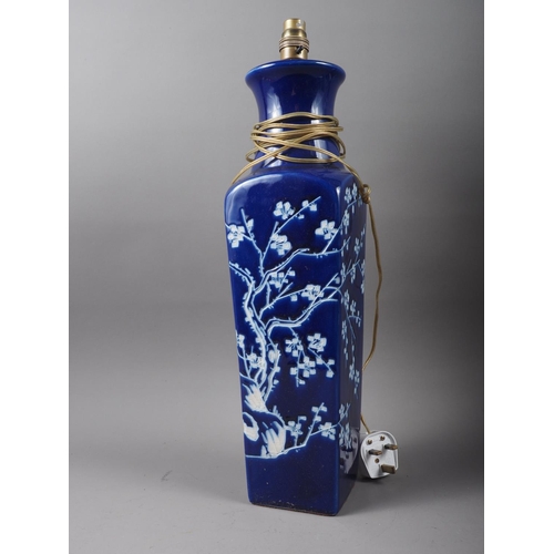 246 - A Chinese blue and white table lamp, decorated prunus, 20