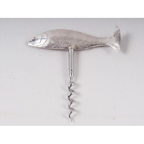 274 - An Edwardian silver handled corkscrew, modelled as a salmon with glass eyes, marks Chester 1912, in ... 