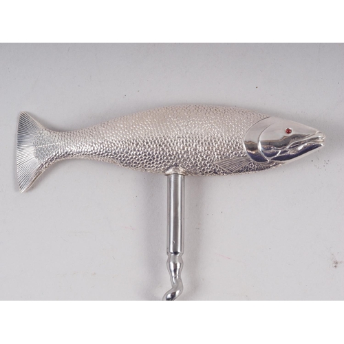 274 - An Edwardian silver handled corkscrew, modelled as a salmon with glass eyes, marks Chester 1912, in ... 