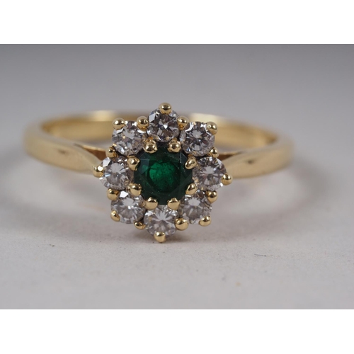 330 - An 18ct yellow gold, emerald and diamond cluster ring, estimated weight of diamonds 40pt, emerald 22... 