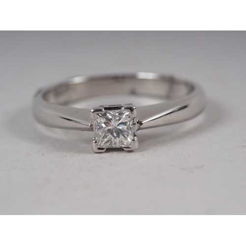 331 - A 950 platinum ring, set single princess cut diamond, 36pts