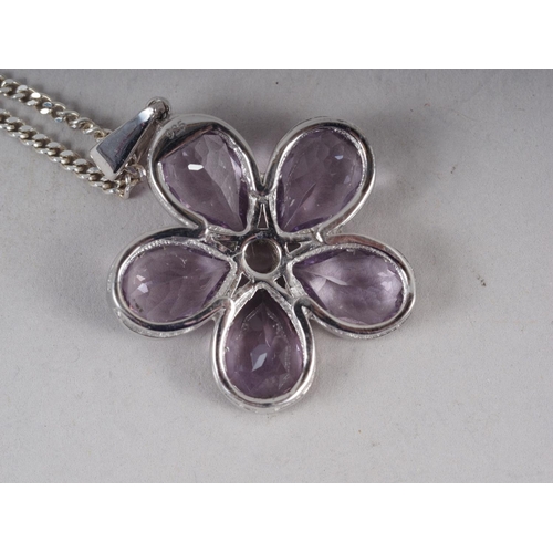 332 - A five stone floral pendant, set amethyst, setting and chain, stamped 925