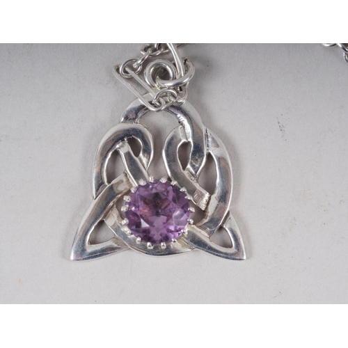 333 - A sterling silver Celtic style pendant, set facetted 9mm amethyst, hallmarked Edinburgh 1970 by JF, ... 