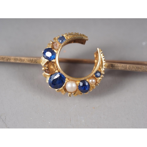 350 - A 14ct gold bar and crescent brooch set sapphires and half pearls (two missing), 7.1g gross, a yello... 