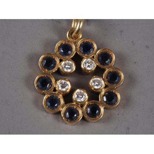 375 - An 18ct gold diamond and sapphire pendant, 5g, on a 14ct gold fine link necklace, 1.9g