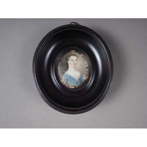 389 - A set of three early 18th century portrait miniatures, inscribed Joseph Banks Esquire of York, Mrs B... 