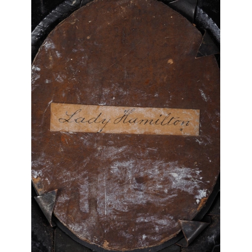 395 - A portrait miniature, inscribed verso Lady Hamilton, 7cm x 5.5cm, in ebonised frame (damages)