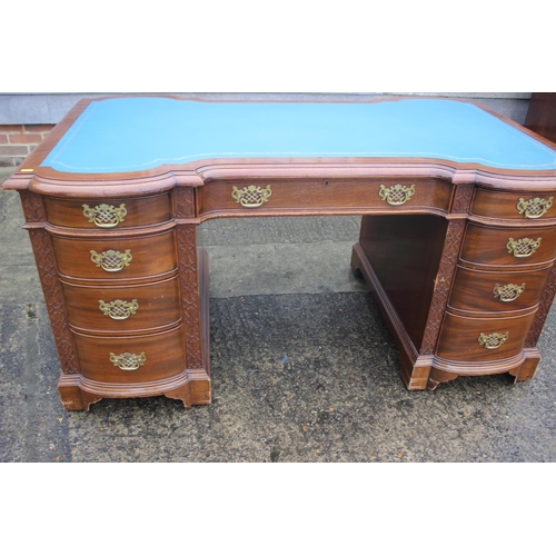 503 - A partners late 19th century carved mahogany double bow and inverse breakfront double pedestal desk ... 