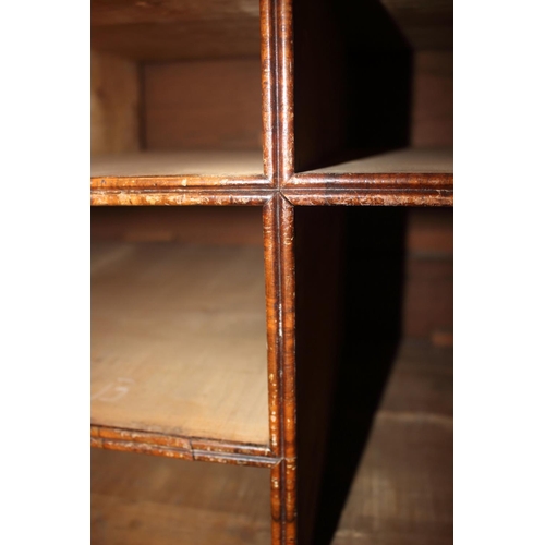 508 - An early Georgian figured walnut and feather banded cupboard of drawers, the upper section fitted tw... 