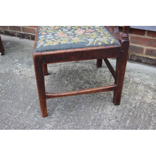 515 - A late 18th century carved mahogany corner elbow chair with needlepoint seat, on square taper and st... 