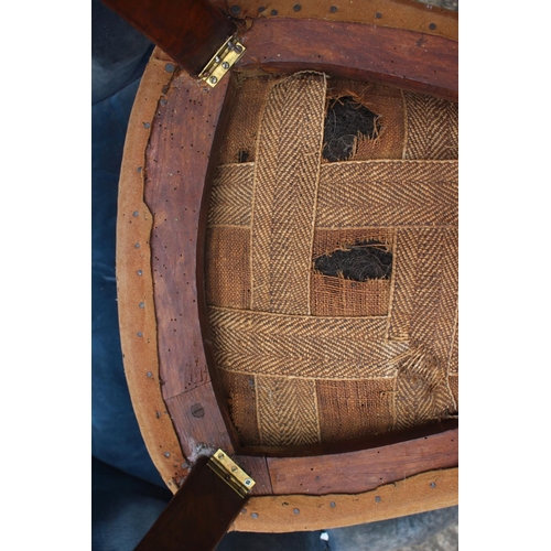 519 - A 19th century low seat nursing chair, on turned supports