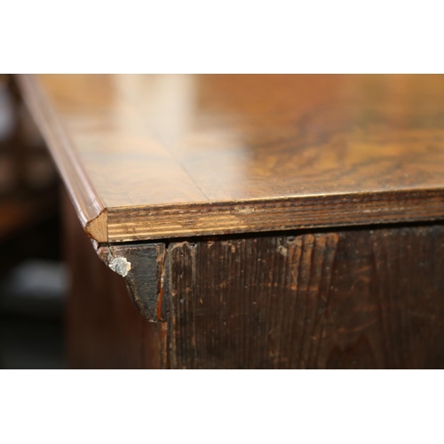 548 - A Georgian figured walnut and feather banded chest on stand, the upper section fitted two small and ... 