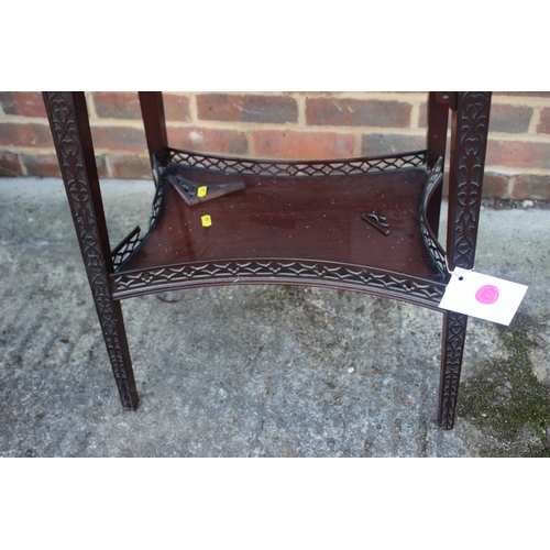 558 - A late 19th century carved mahogany fretwork two-tier patience table, on splay supports, 20