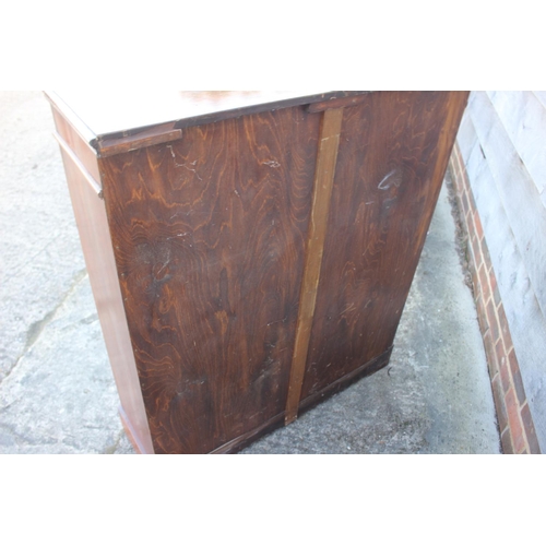 559 - A 19th century walnut bookcase enclosed two glazed panel doors, on block base, 36