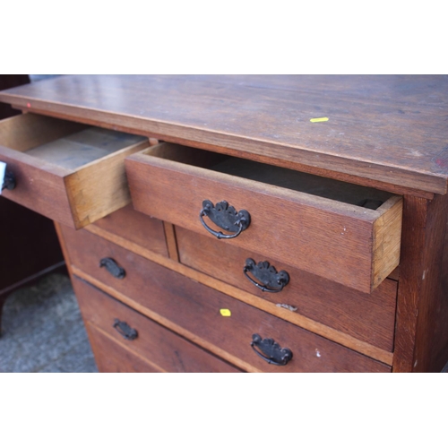 560 - A late 19th century oak chest of four short and three long graduated drawers, on later castored supp... 