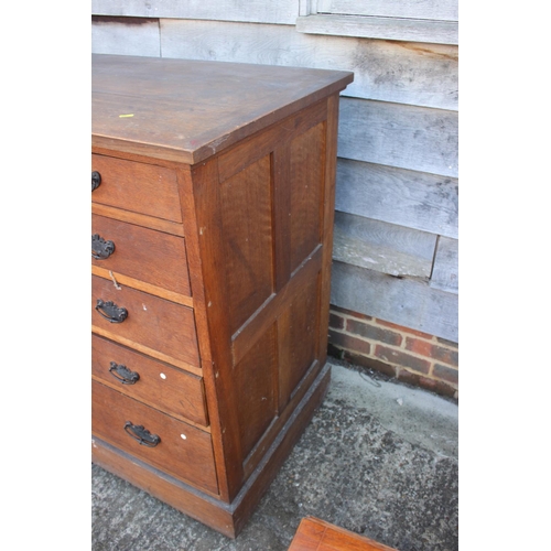 560 - A late 19th century oak chest of four short and three long graduated drawers, on later castored supp... 