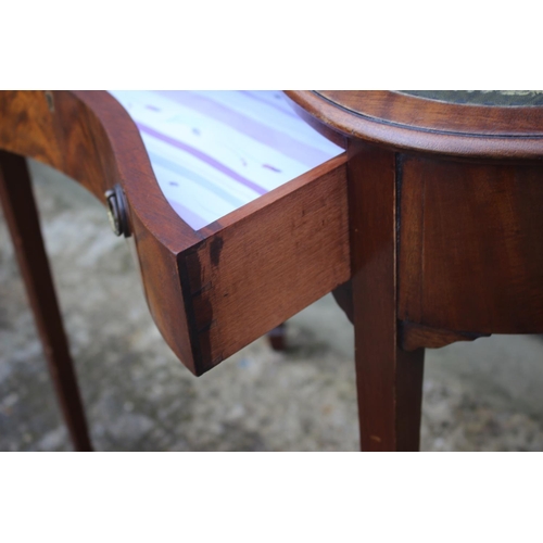 582 - A mahogany kidney-shape desk with tooled lined top, fitted one drawer, on square taper supports, 30