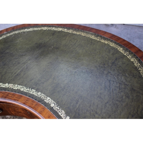 582 - A mahogany kidney-shape desk with tooled lined top, fitted one drawer, on square taper supports, 30