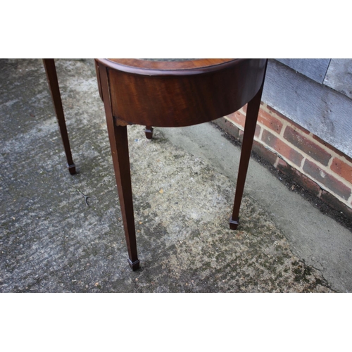 582 - A mahogany kidney-shape desk with tooled lined top, fitted one drawer, on square taper supports, 30