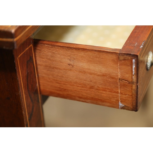 596 - An Edwardian rosewood and inlaid writing desk, fitted two cupboards over two drawers, on square tape... 