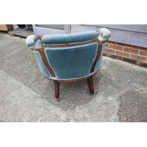 597 - An Edwardian rosewood and inlaid tub-shape chair, upholstered in a blue velour, on square taper supp... 