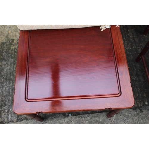 607 - A Chinese hardwood circular dining table, fitted four frieze drawers, on faux bamboo cluster column,... 