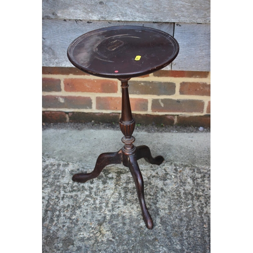 651 - A mahogany and banded and inlaid fold-over top card table, on square taper supports, 36