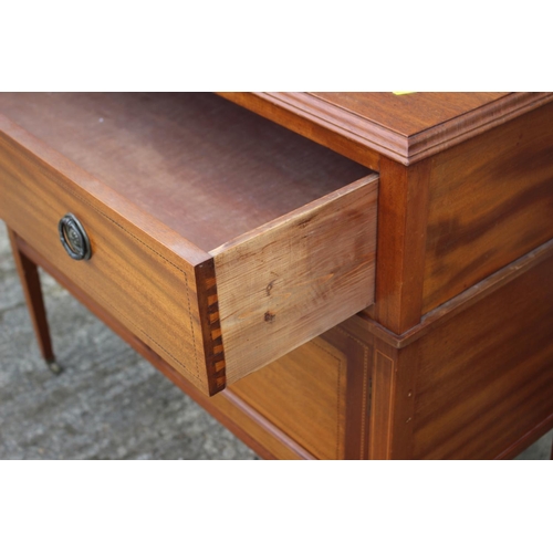 653 - An Edwardian walnut box and ebony strung ledge back sideboard, fitted one long drawer over cupboards... 