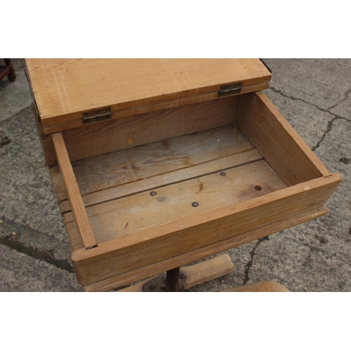 665 - A McCarthy Brothers cast iron and pine school desk with attached chair, 22