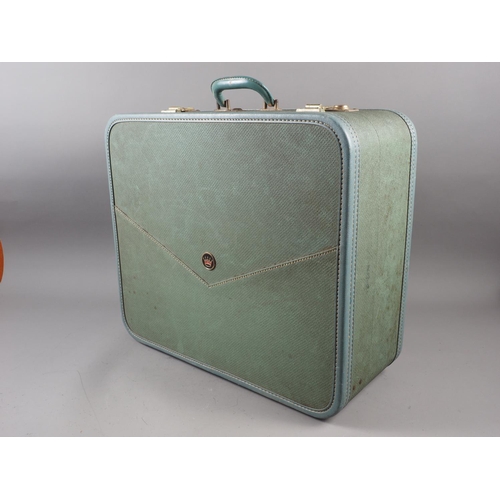 673 - A leather vintage suitcase and a number of other suitcases, various