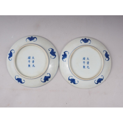 95 - A pair of Chinese porcelain blue and white dishes, decorated dragons, clouds, and flaming pearls, ba... 