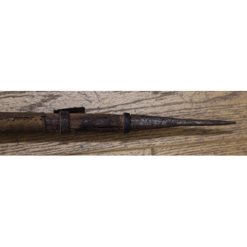 177 - An African spear with steel point and hidebound shaft, 68