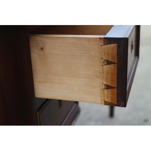 529 - A late 19th century Continental figured mahogany inverse breakfront writing desk, fitted four small ... 